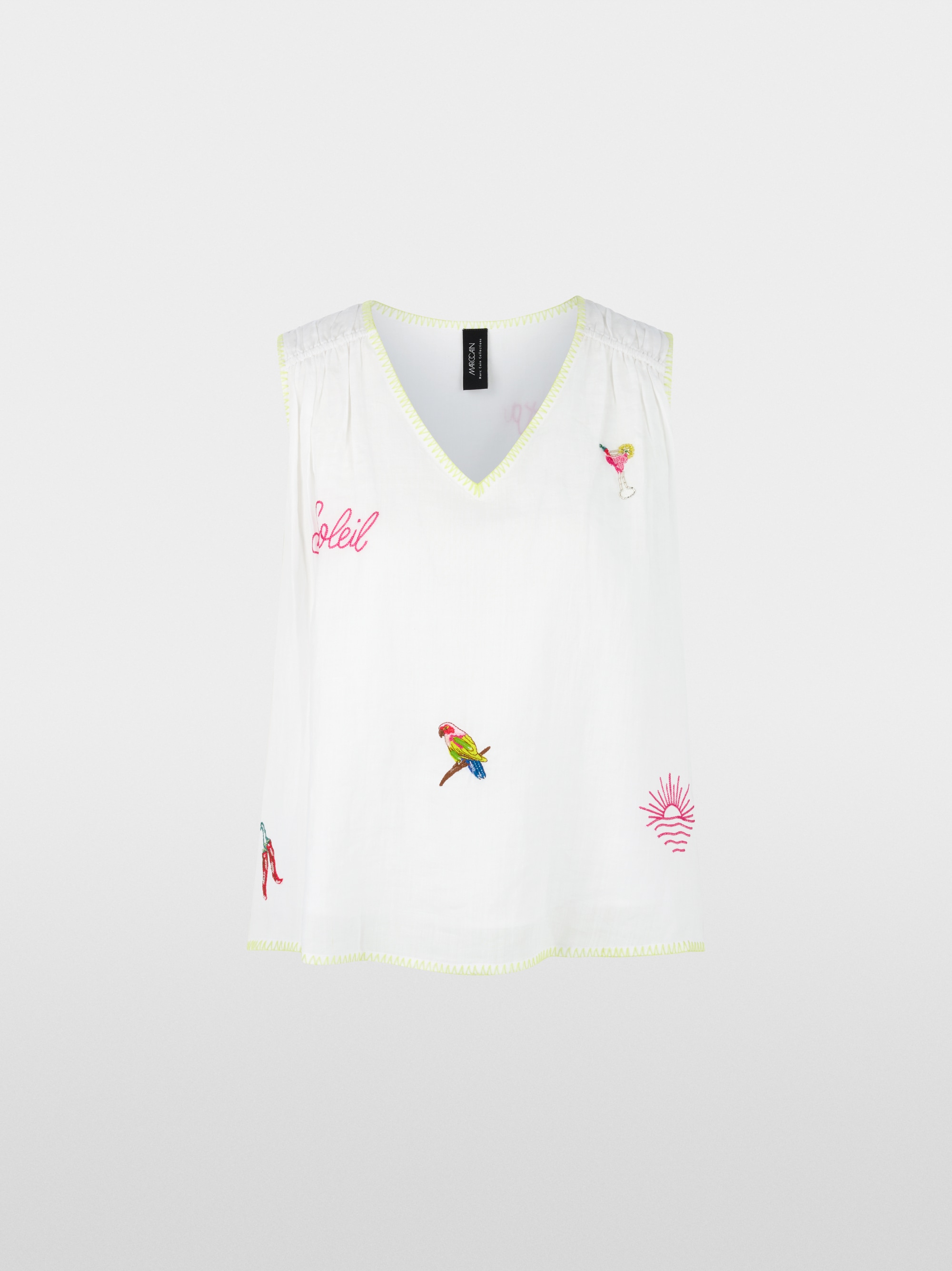 Loose top with embroidered patches