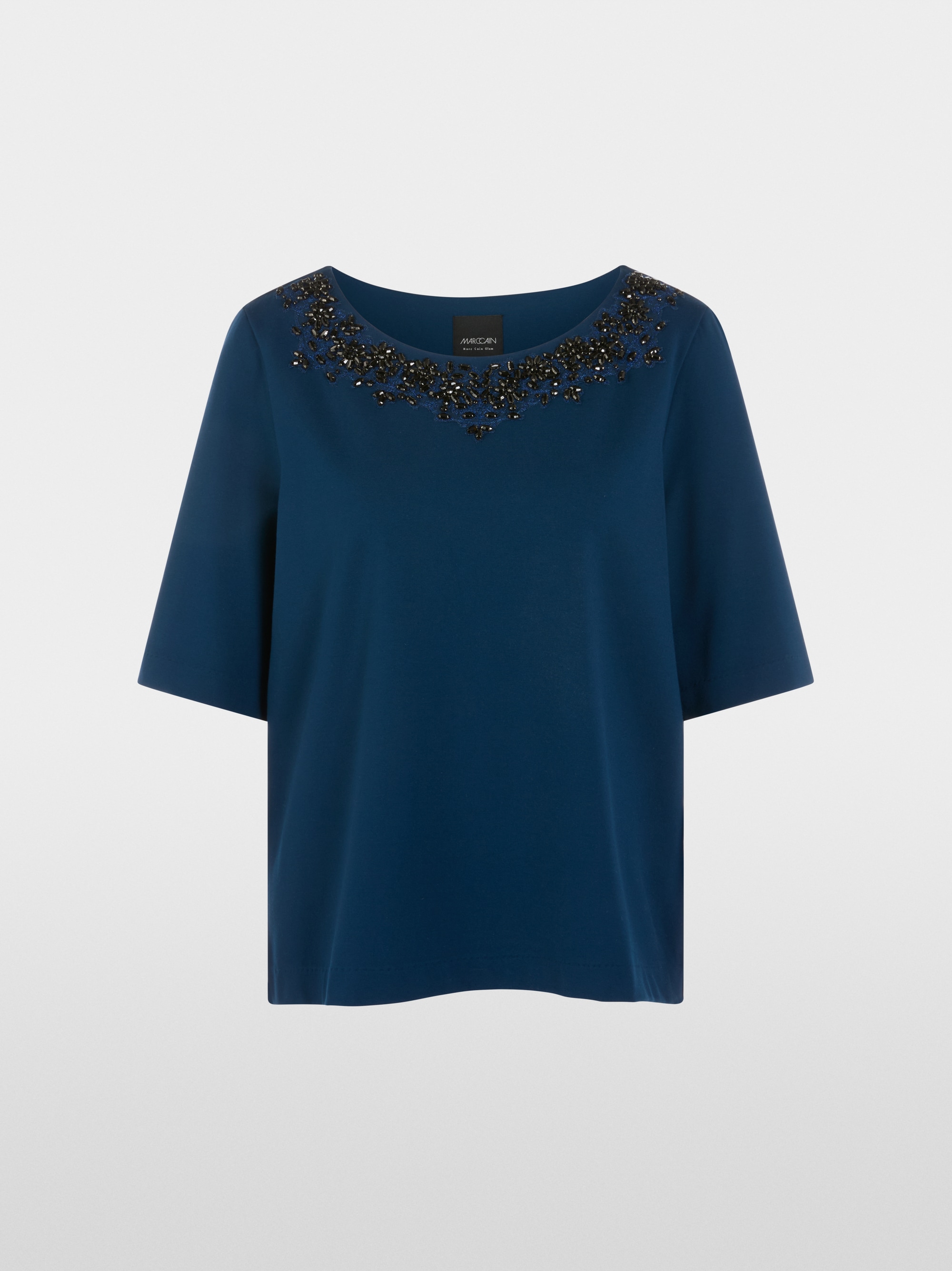 Shirt with opulent embellishment