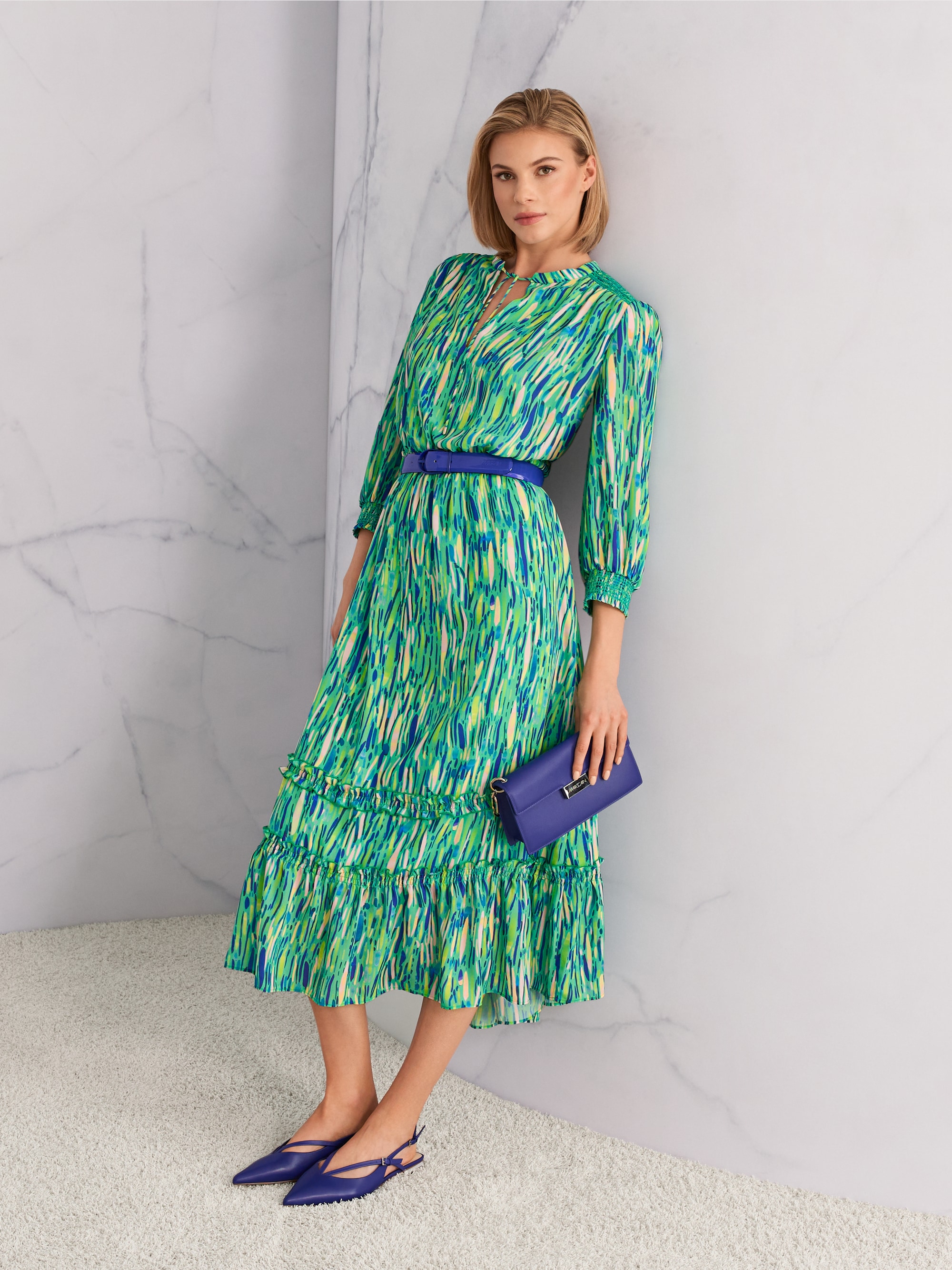 Patent leather belt with logo embossing