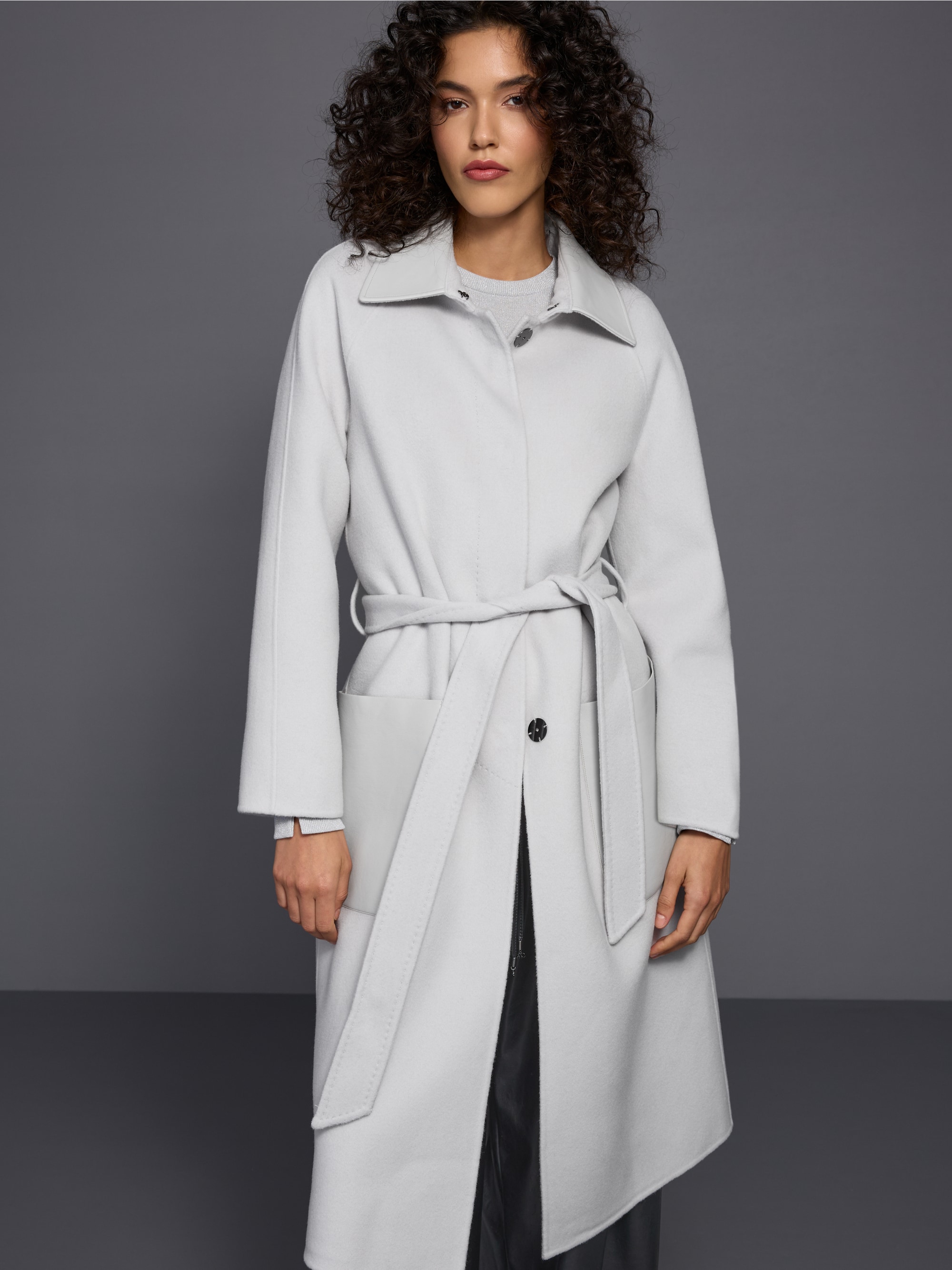 Short coat with leather details