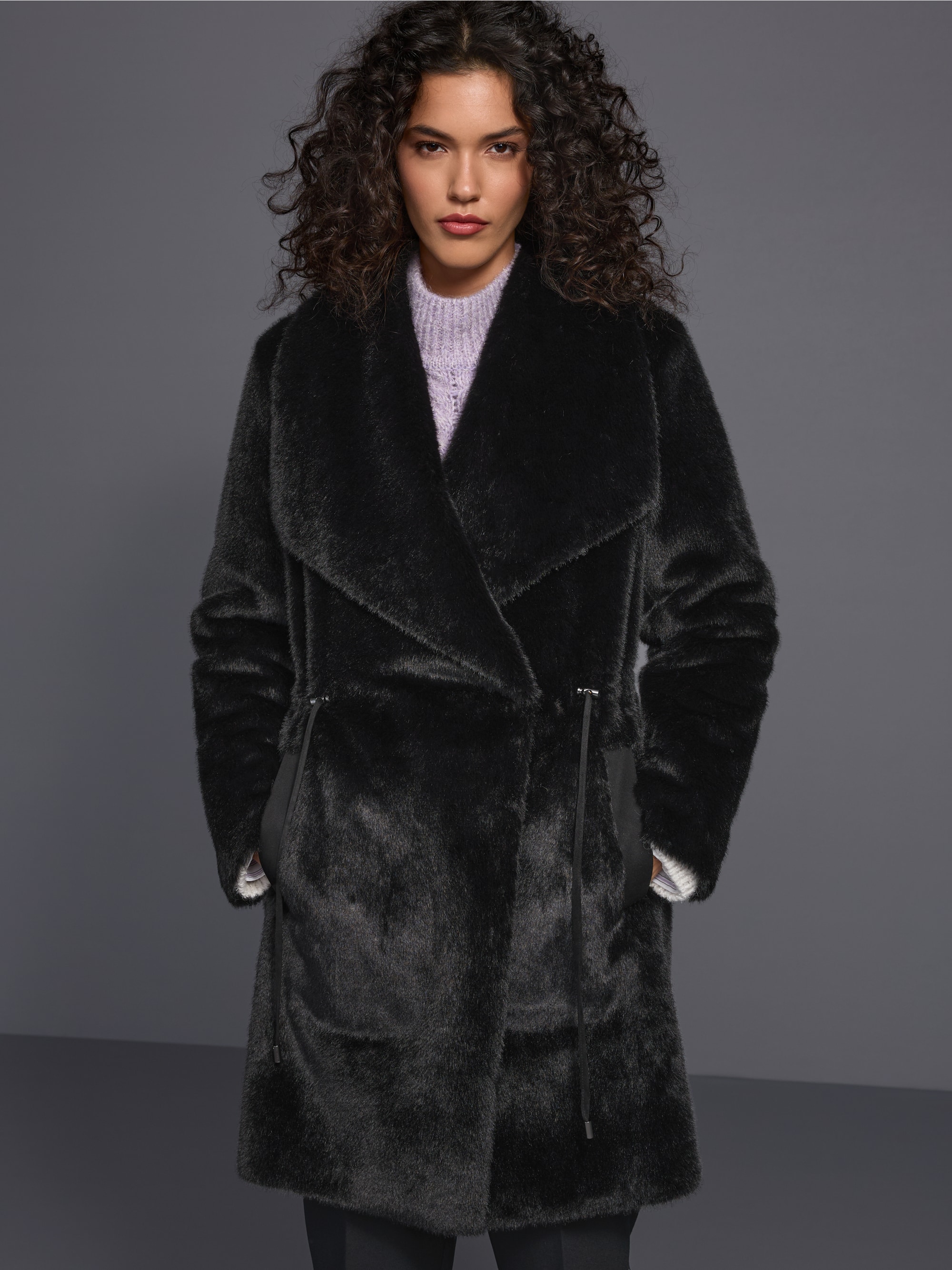 Manteau luxueux en fausse fourrure