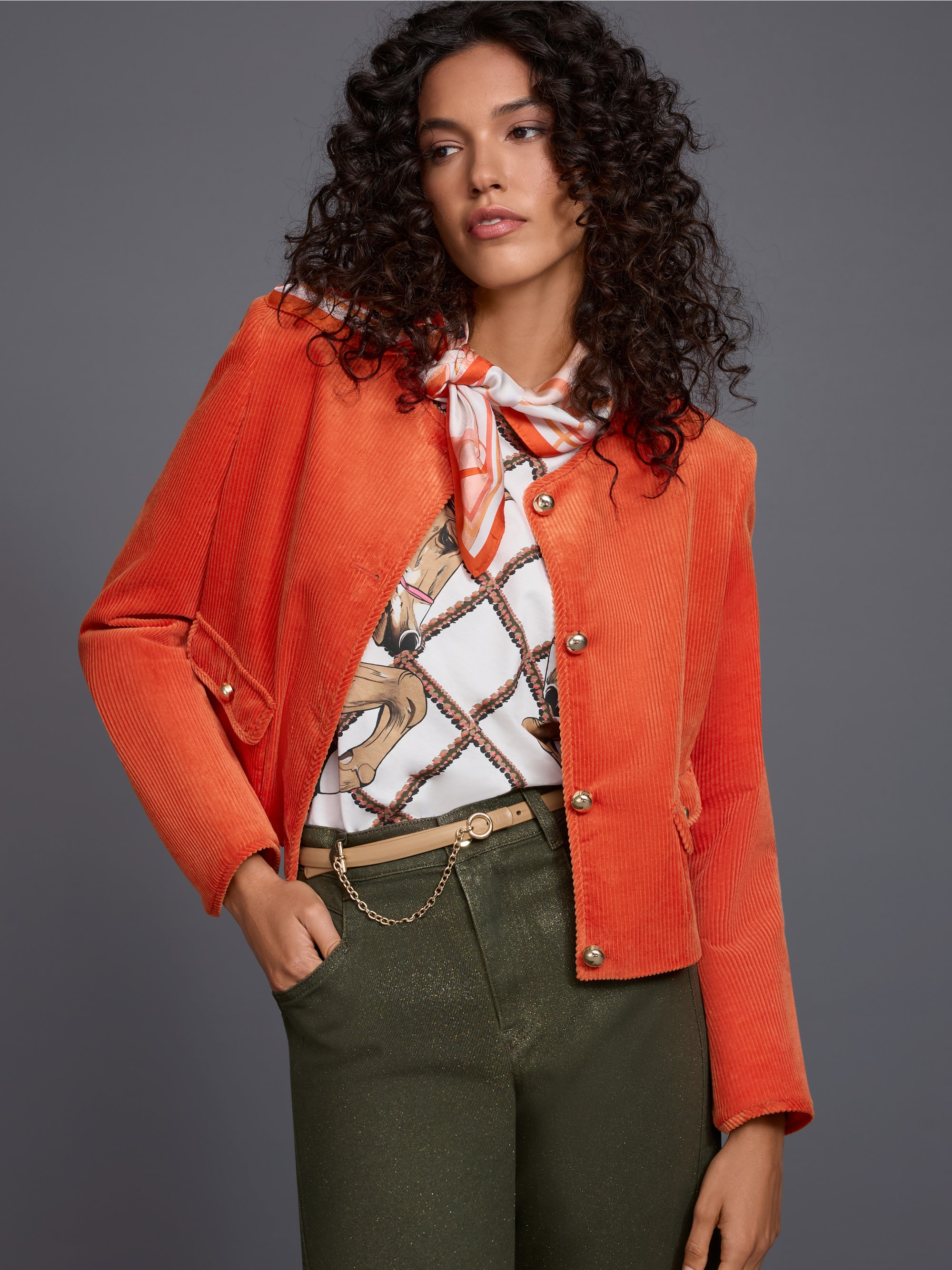 Short jacket with decorative buttons