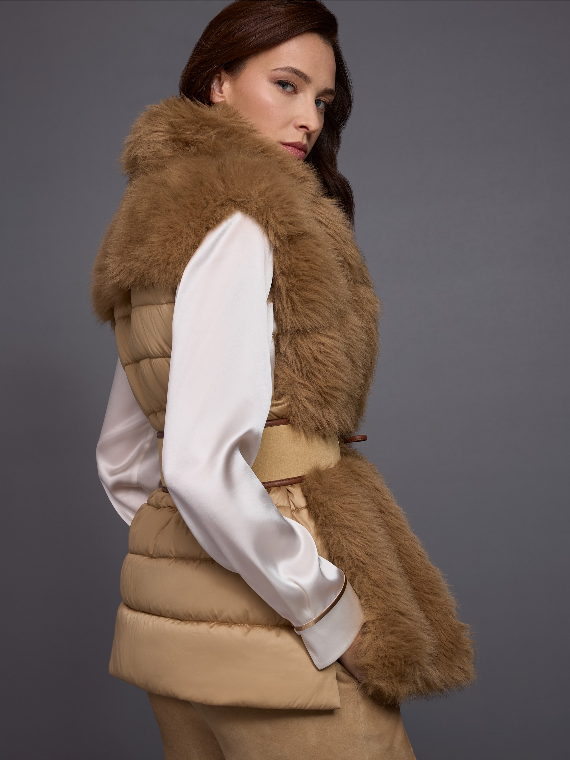 Faux fur waistcoat with quilted back