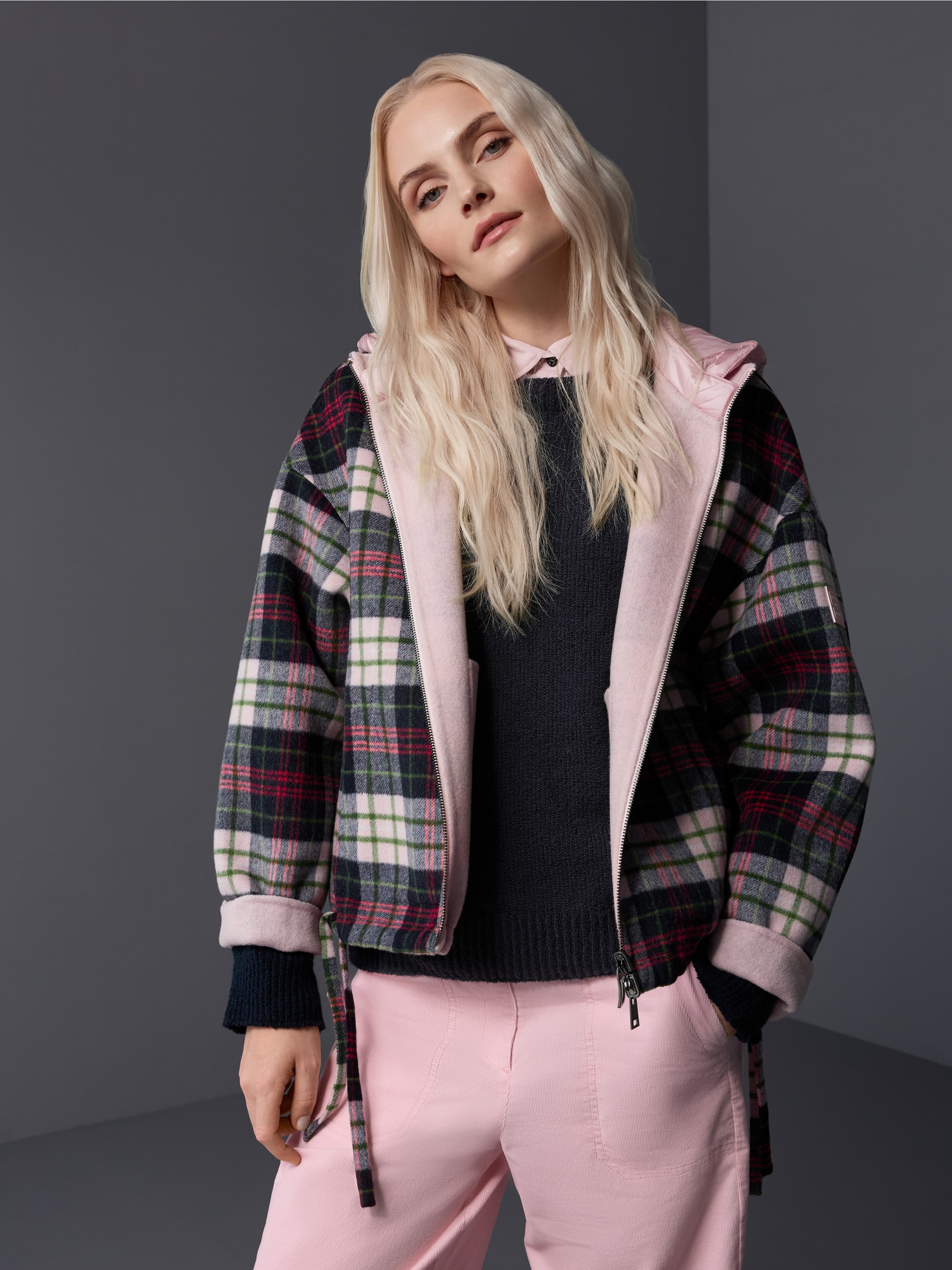 Reversible jacket with quilted hood
