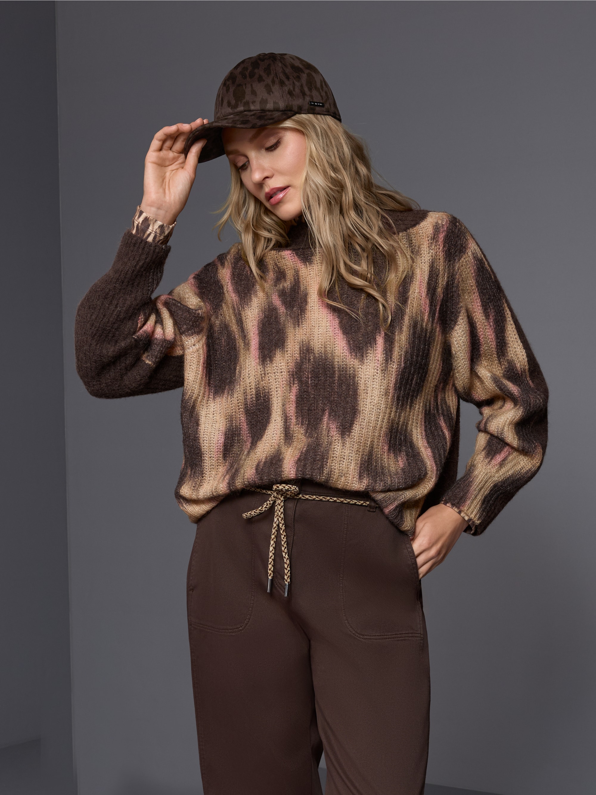 Leopard print cap with adjustable strap