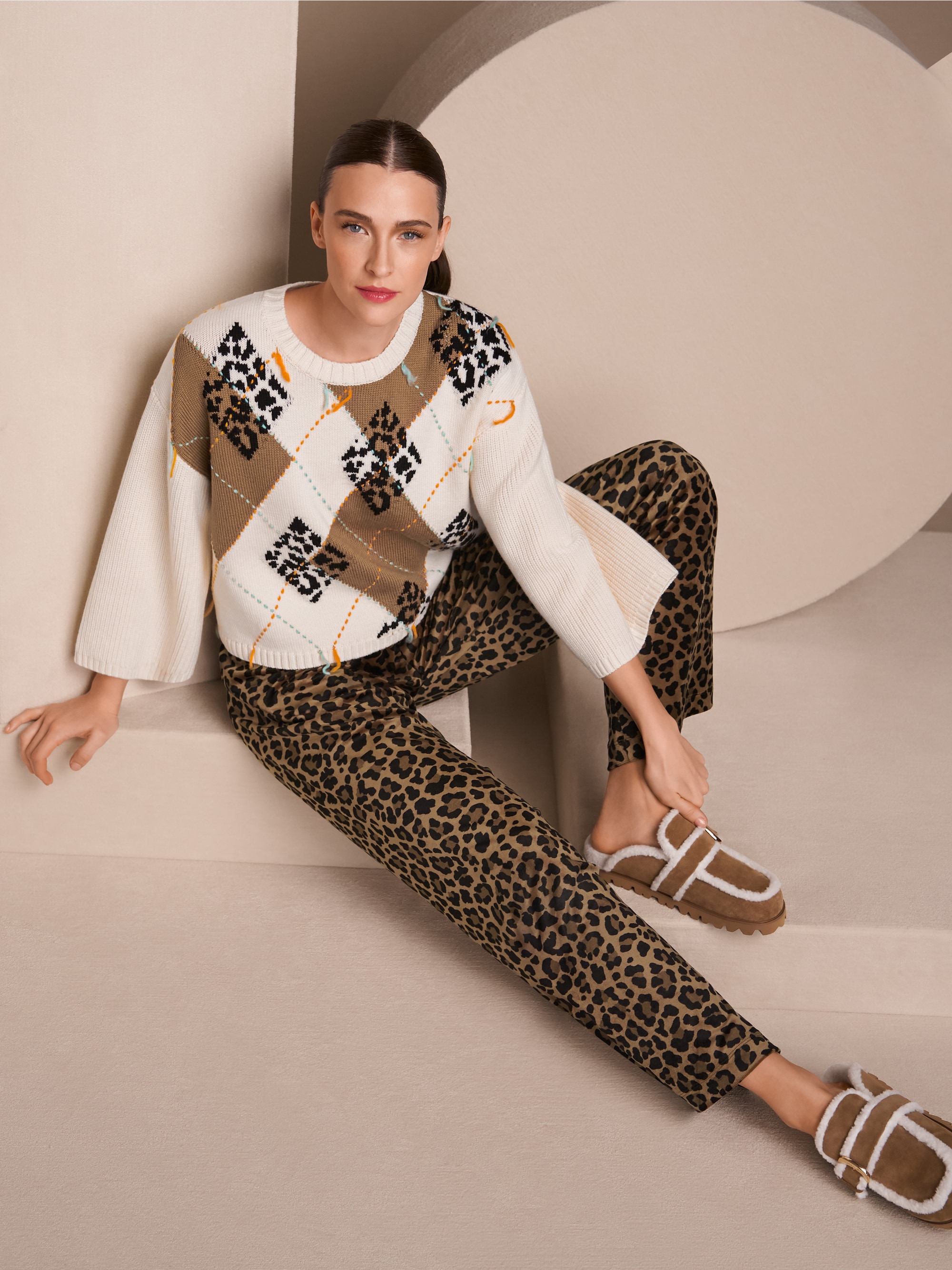 Wool jumper with argyle and fringes