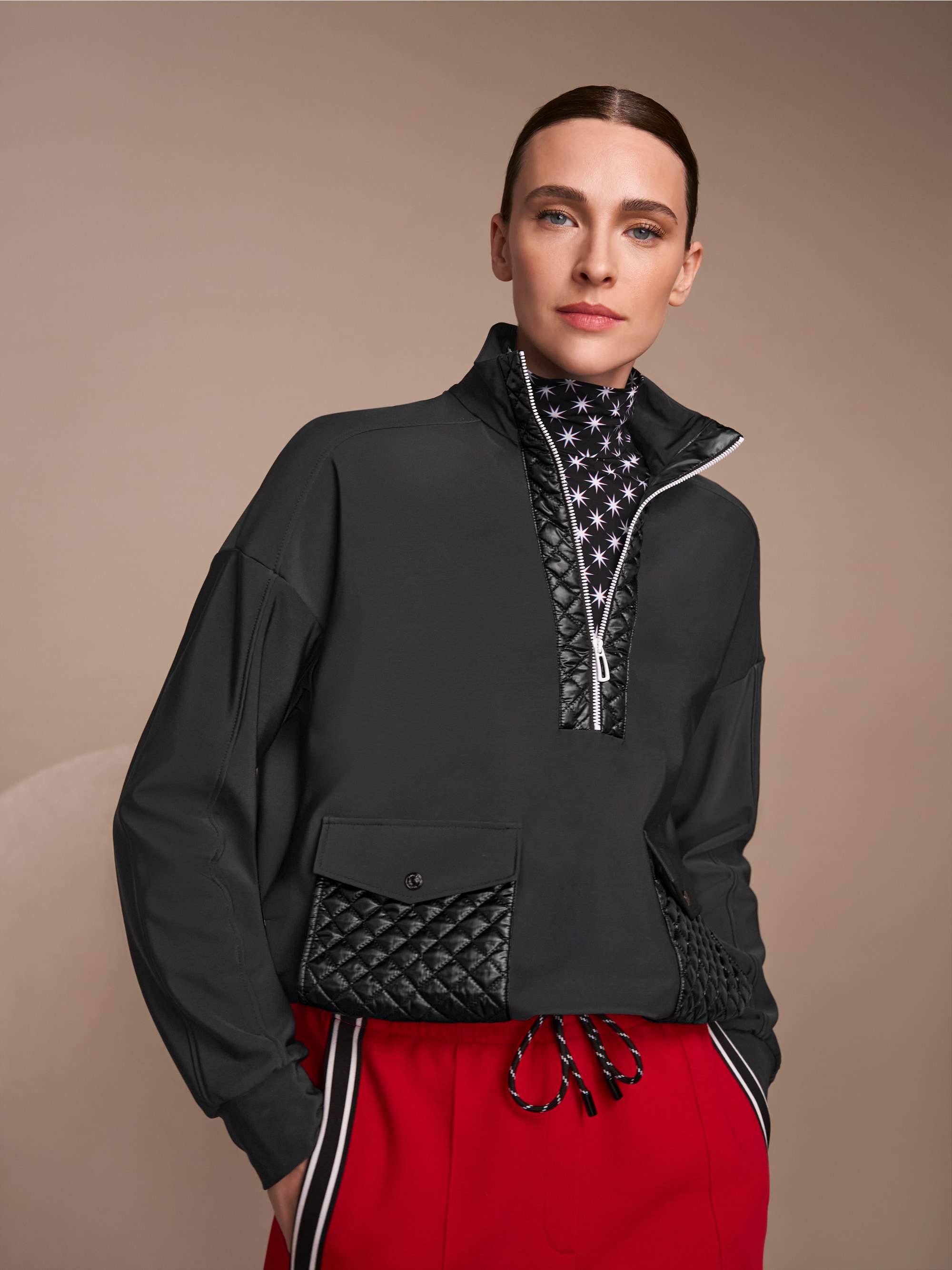 Sweater with stand-up neck and pockets