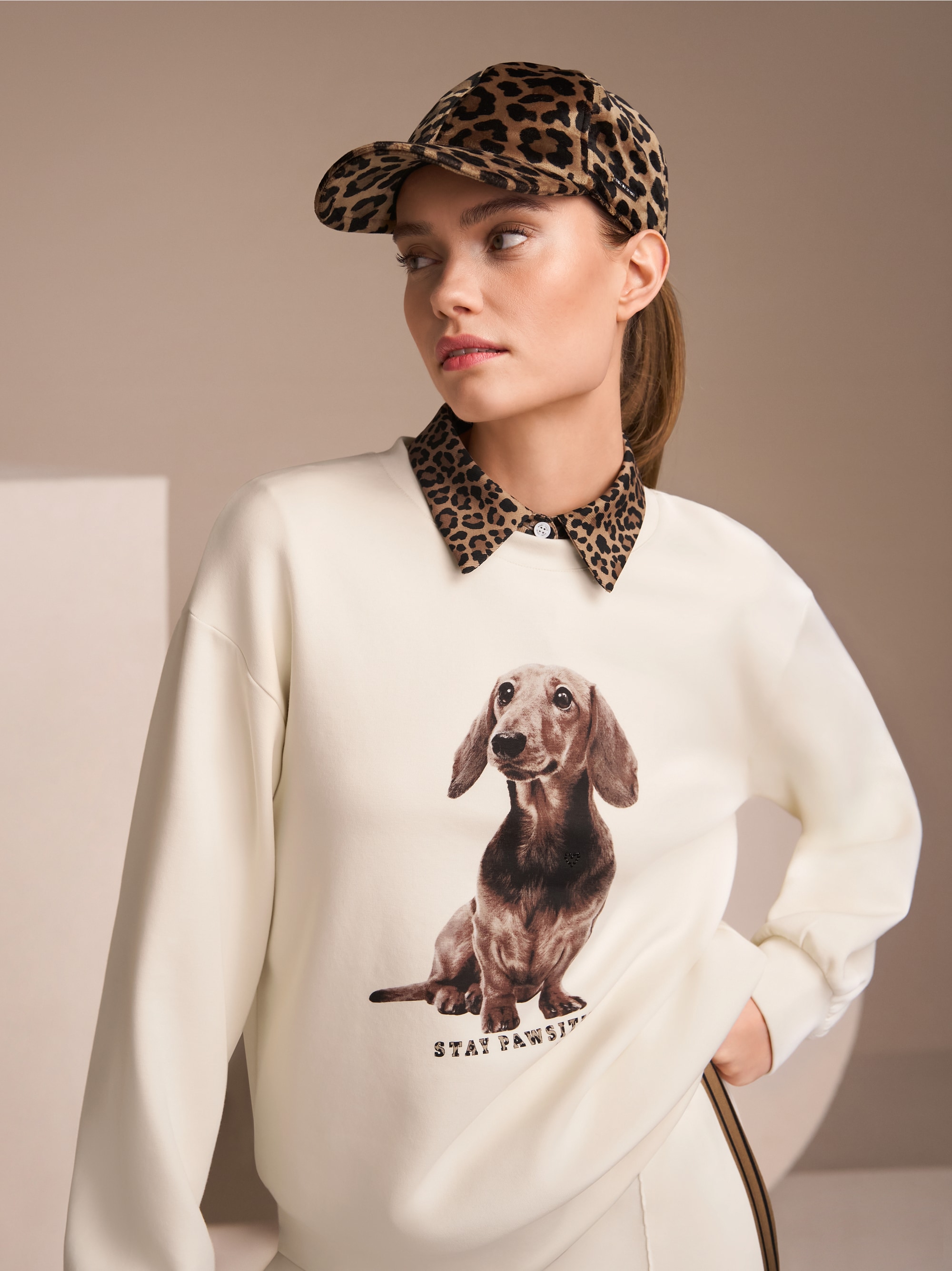 Plain polo shirt with leopard details
