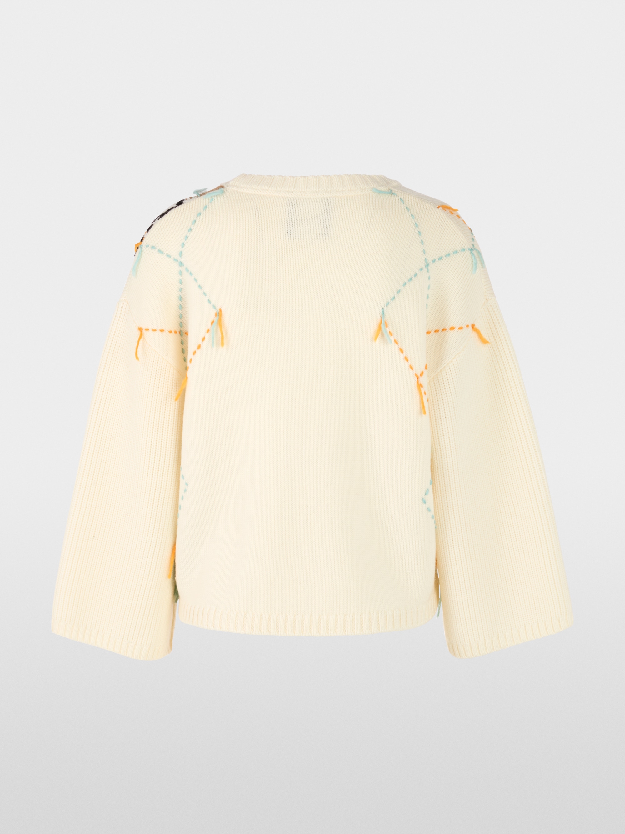 Wool jumper with argyle and fringes