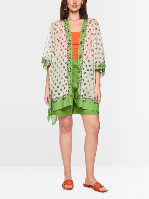 ‘Knitted in Germany’ printed cape