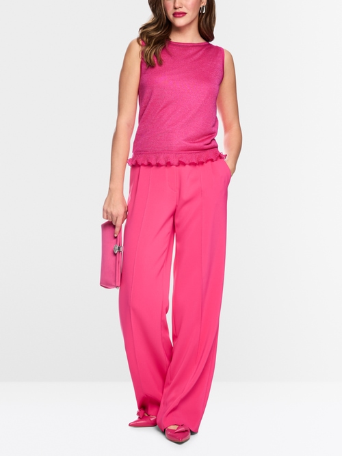 Sleeveless knit top with ruffle