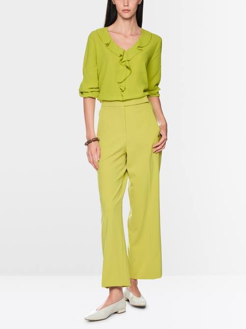 Blouse with flounces
