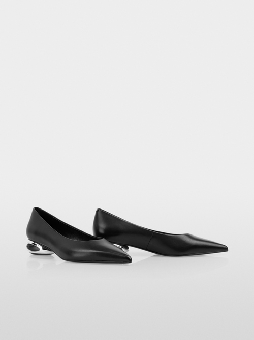 Pumps with metallic heel