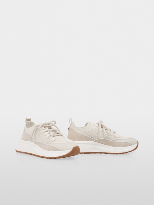 Baskets en tricot avec empiècements en cuir