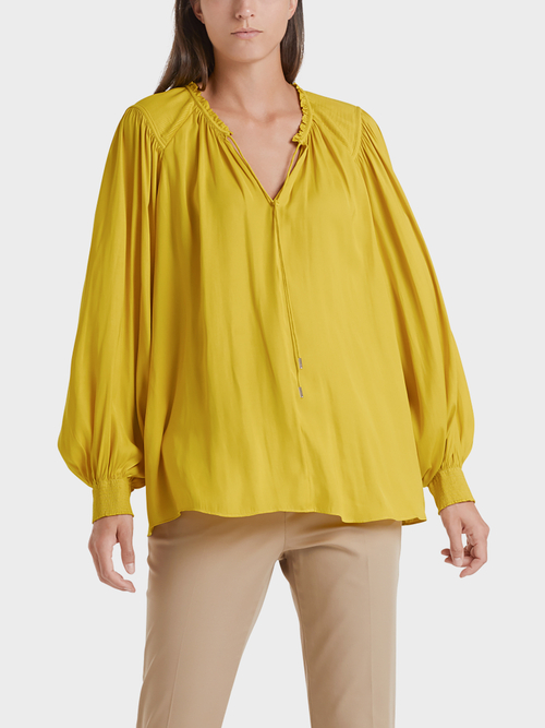 Verspielte Bluse mit Volumen
