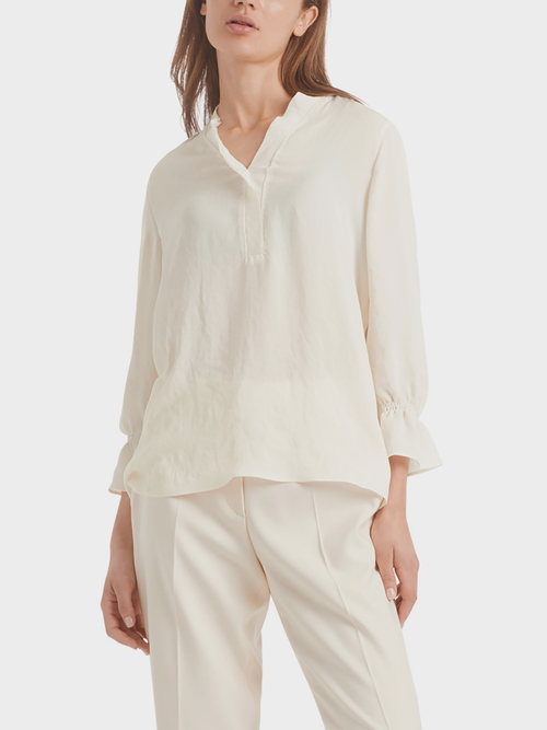 Blouse-style top with flounce details