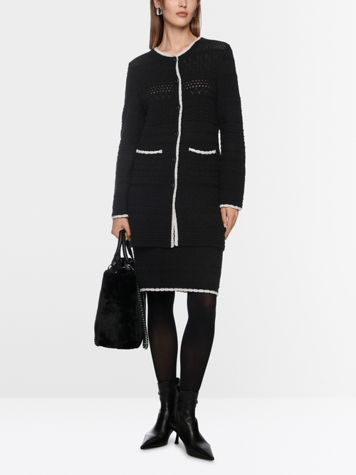 Cardigan long tricoté en Allemagne