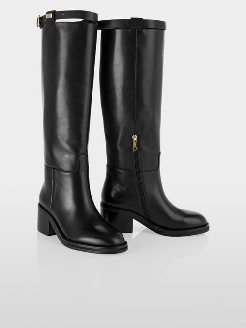 Leather boots with decorative strap