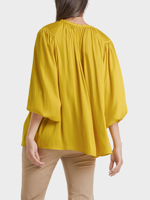Verspielte Bluse mit Volumen