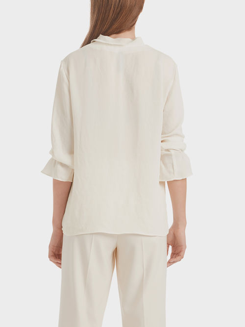Blouse-style top with flounce details