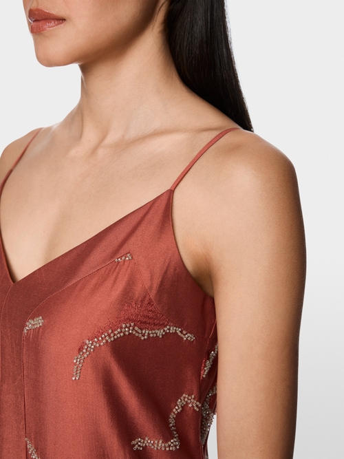 Mid-length dress featuring pearls
