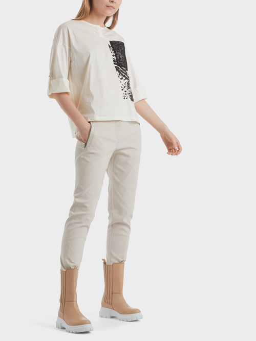 Blouse-style top with mesh pocket