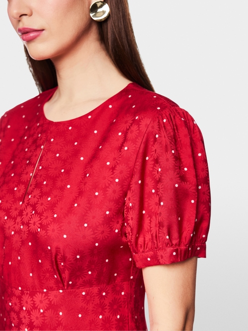 Feminine midi dress with polka dots