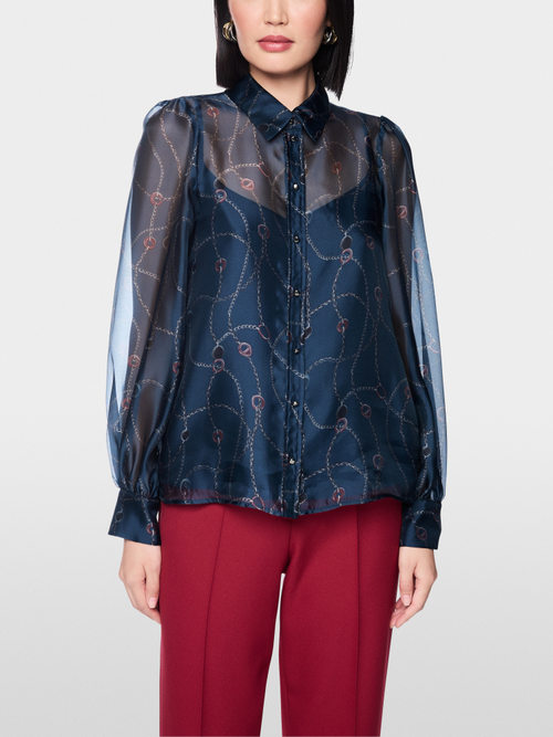 Delicate blouse with detachable top