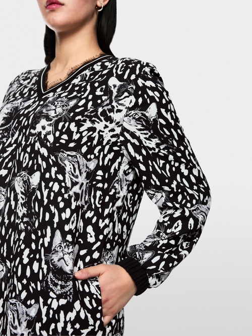 Dress with print and flounce