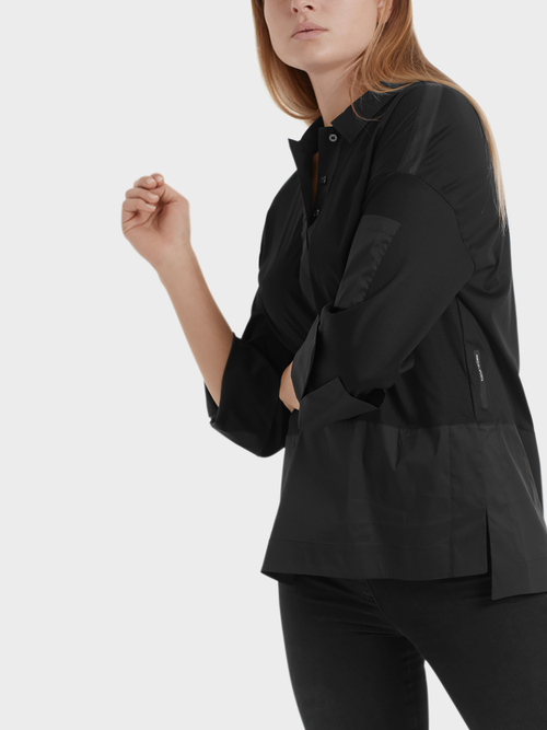 Blouse-style top with pocket detail