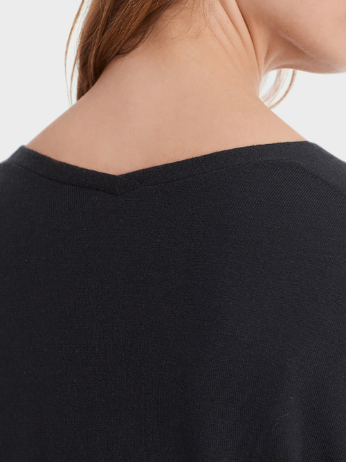 Fine-knit sweater with cable details