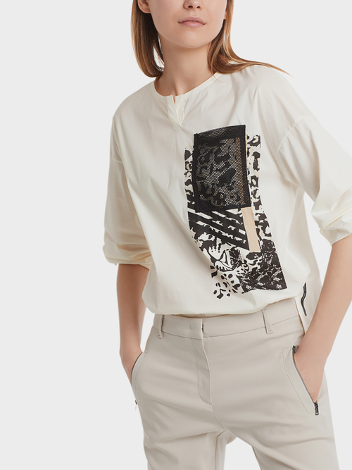 Blouse-style top with mesh pocket