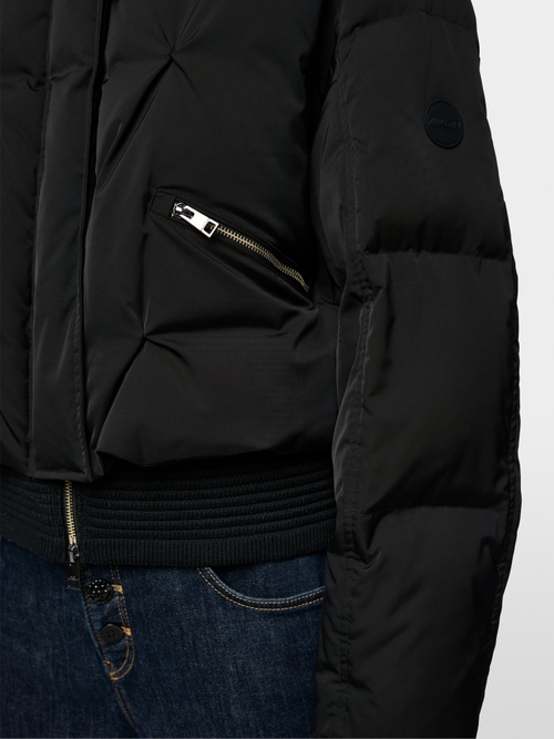Veste matelassée en duvet avec bordure tricotée