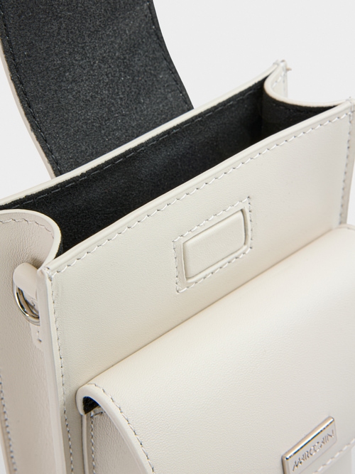 Mini leather bag with outer pockets
