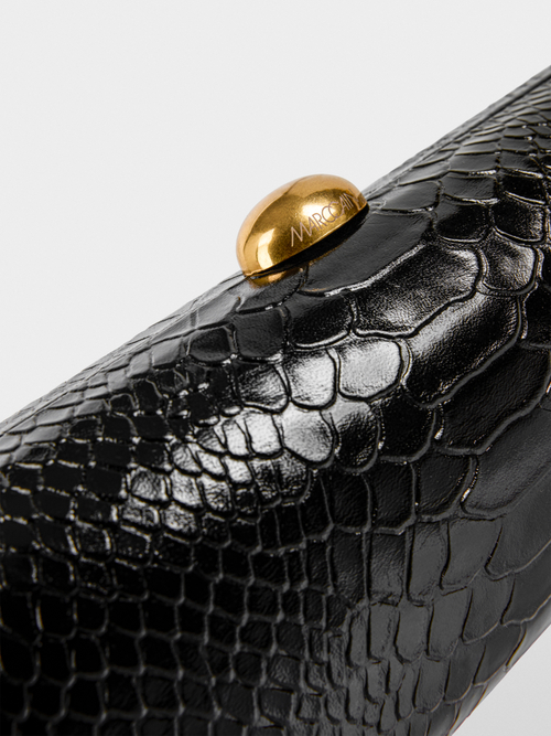 Leather clutch in snake look