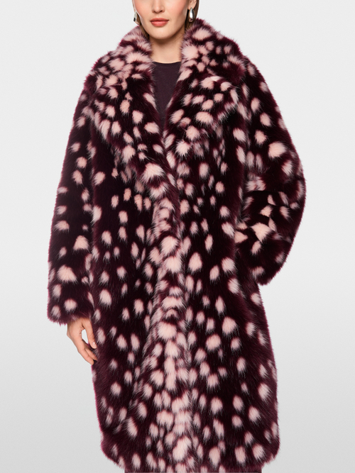 Coat with striking polka dot print