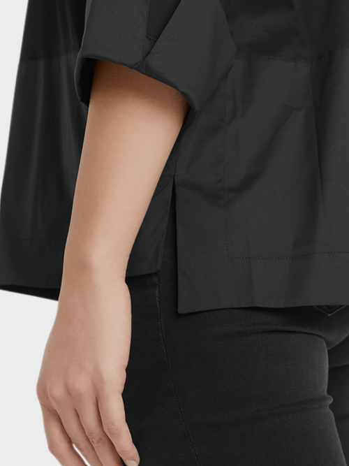 Blouse-style top with pocket detail