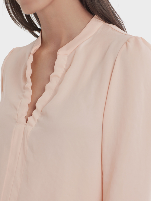Blouse with feminine details