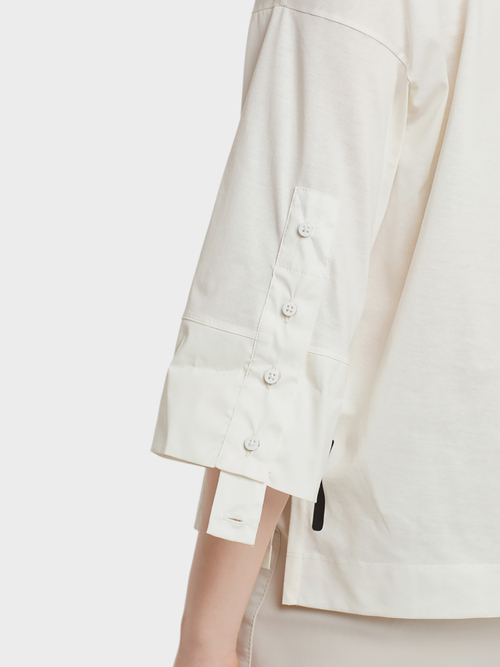 Blouse-style top with mesh pocket