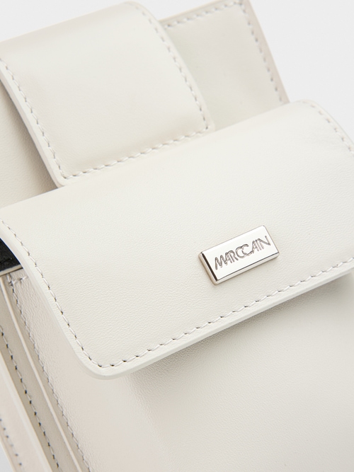 Mini leather bag with outer pockets