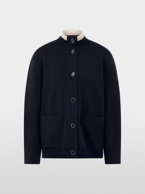 Jacket with knitted details