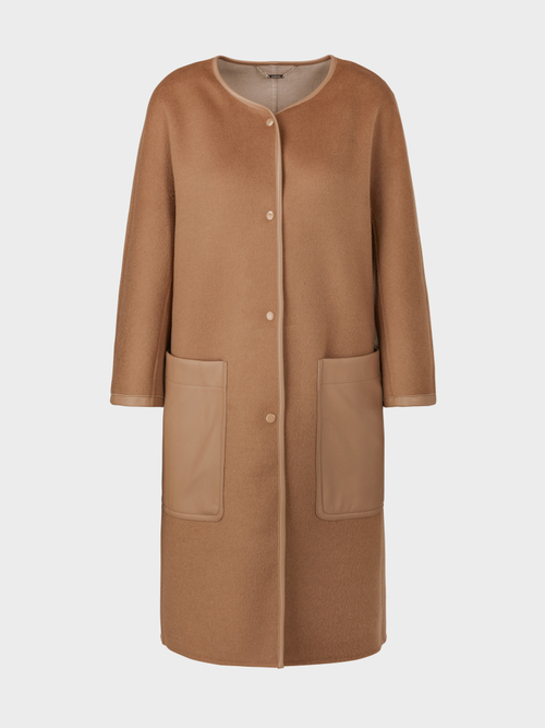 Manteau réversible double face exclusif