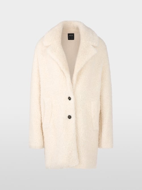 Manteau court bouclé tricoté en Allemagne