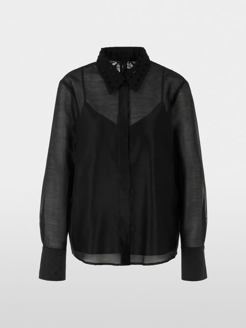 Blouse van organza met borduursel