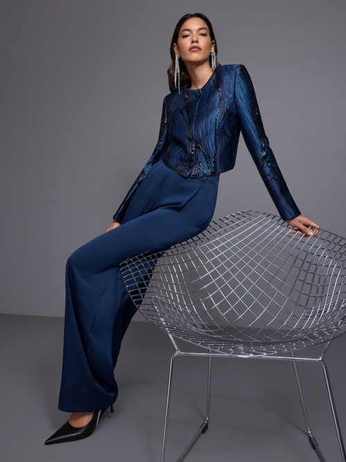 WEDI wide-cut pleated trousers