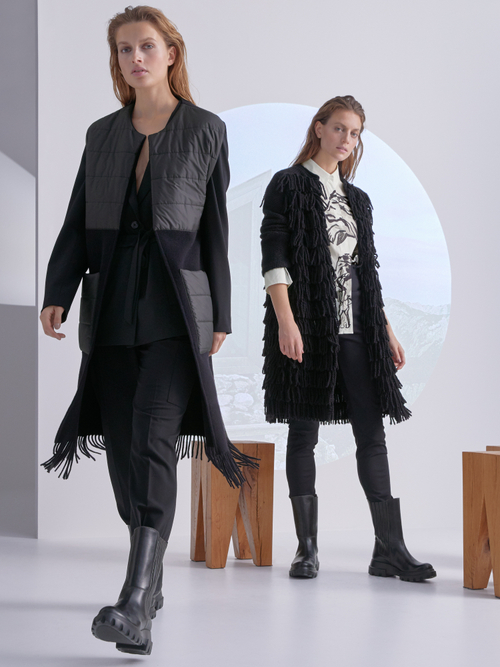 Veste cape sans manches à empiècements