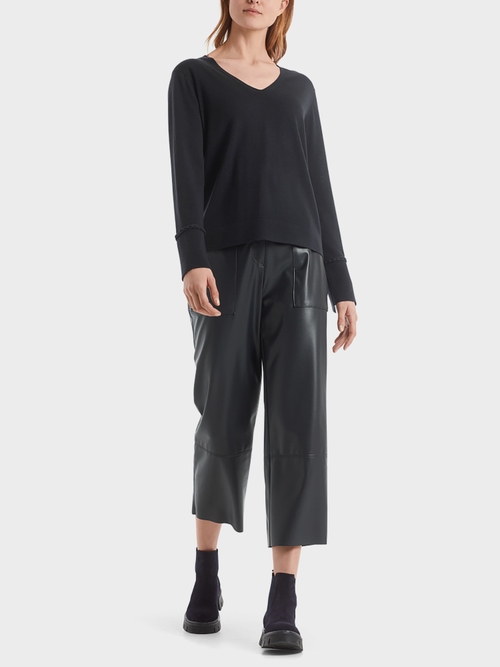 Fine-knit sweater with cable details