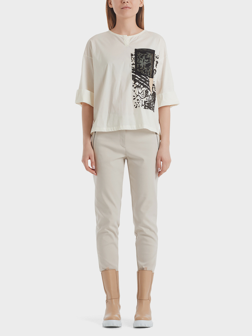 Blouse-style top with mesh pocket