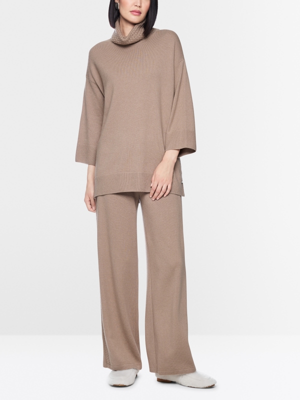 ‘Knitted in Germany’ turtle neck jumper