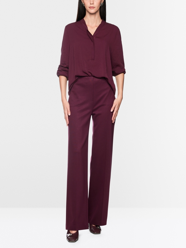 Loose-fitting blouse with V-neck